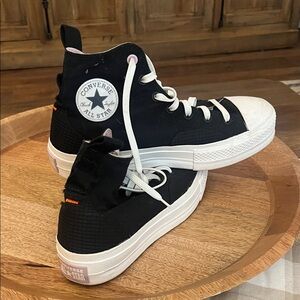 Converse Black and White High-Top Sneakers